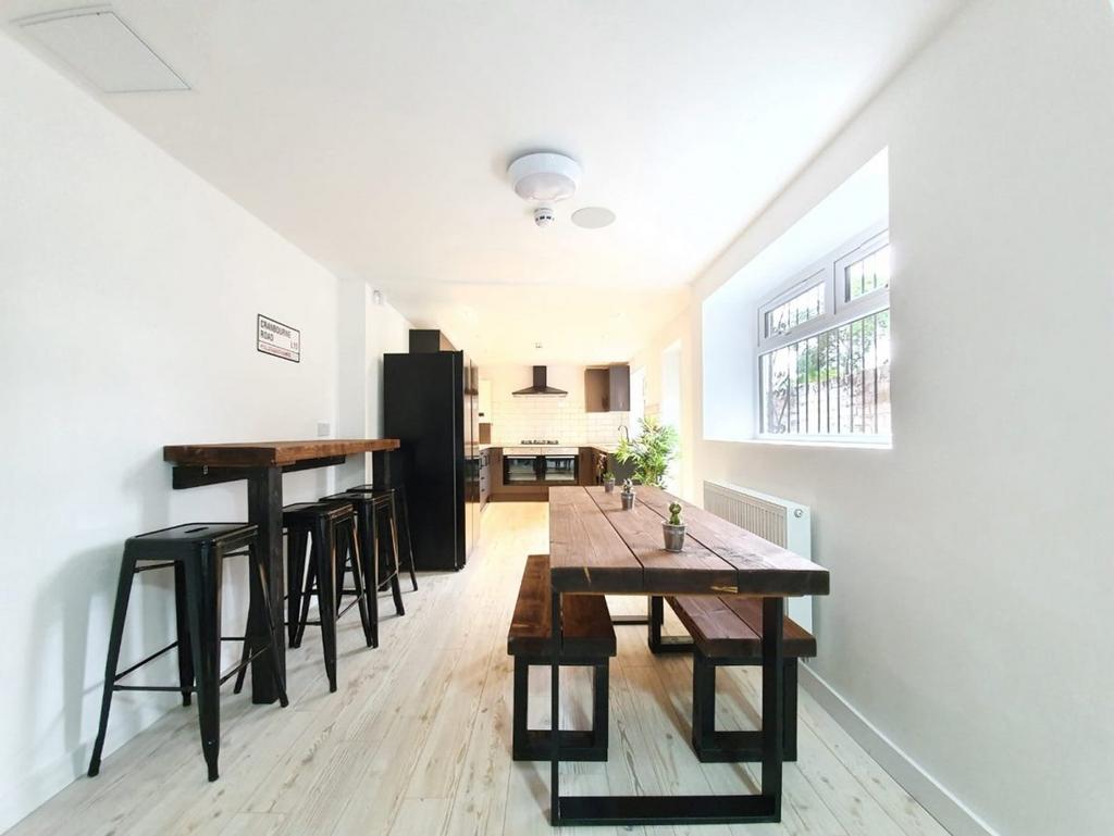 A bright and spacious kitchen area with modern ...