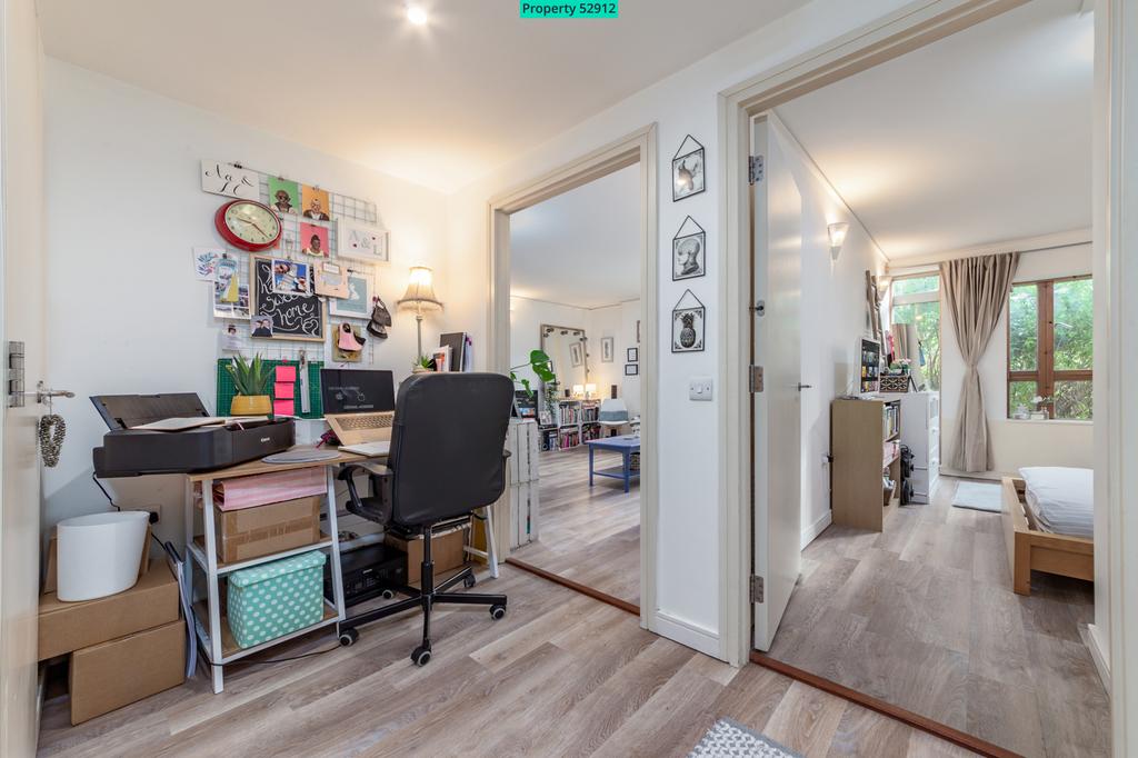 Spacious hallway with ample workspace