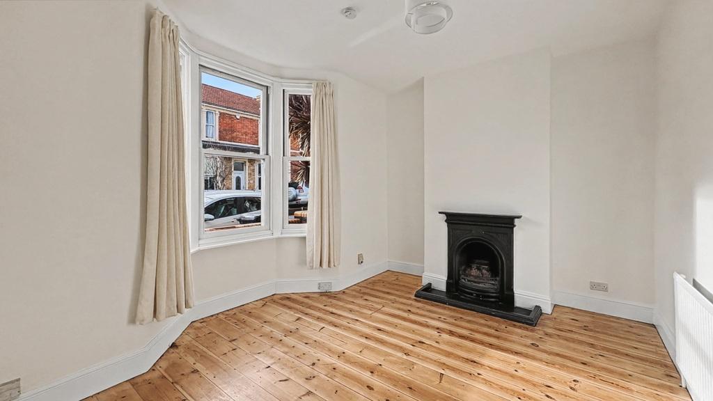 Bright, characterful bedroom with a bay window,...