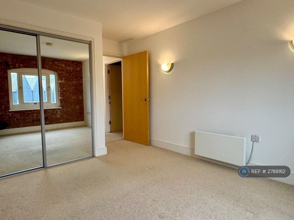Downstairs Bedroom Showing Built In Wardrobes