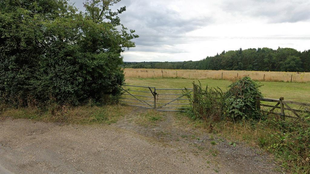 Road frontage &amp; gated access onto Old House Lane.