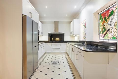 undefined, Adam & Eve Mews, W8