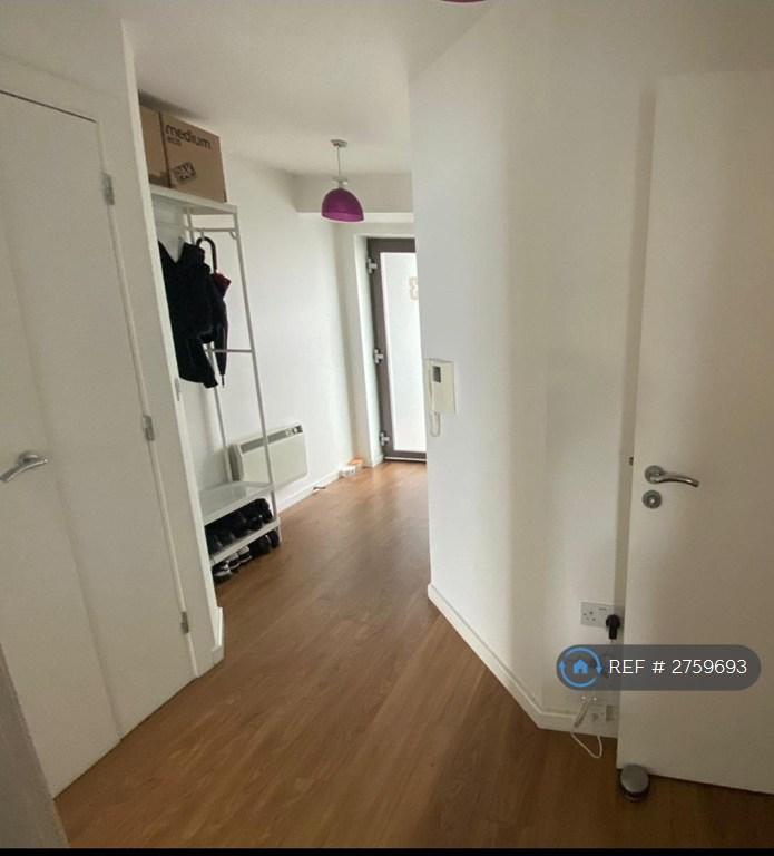 Hallway And Laundry Cupboard With Washing Machine