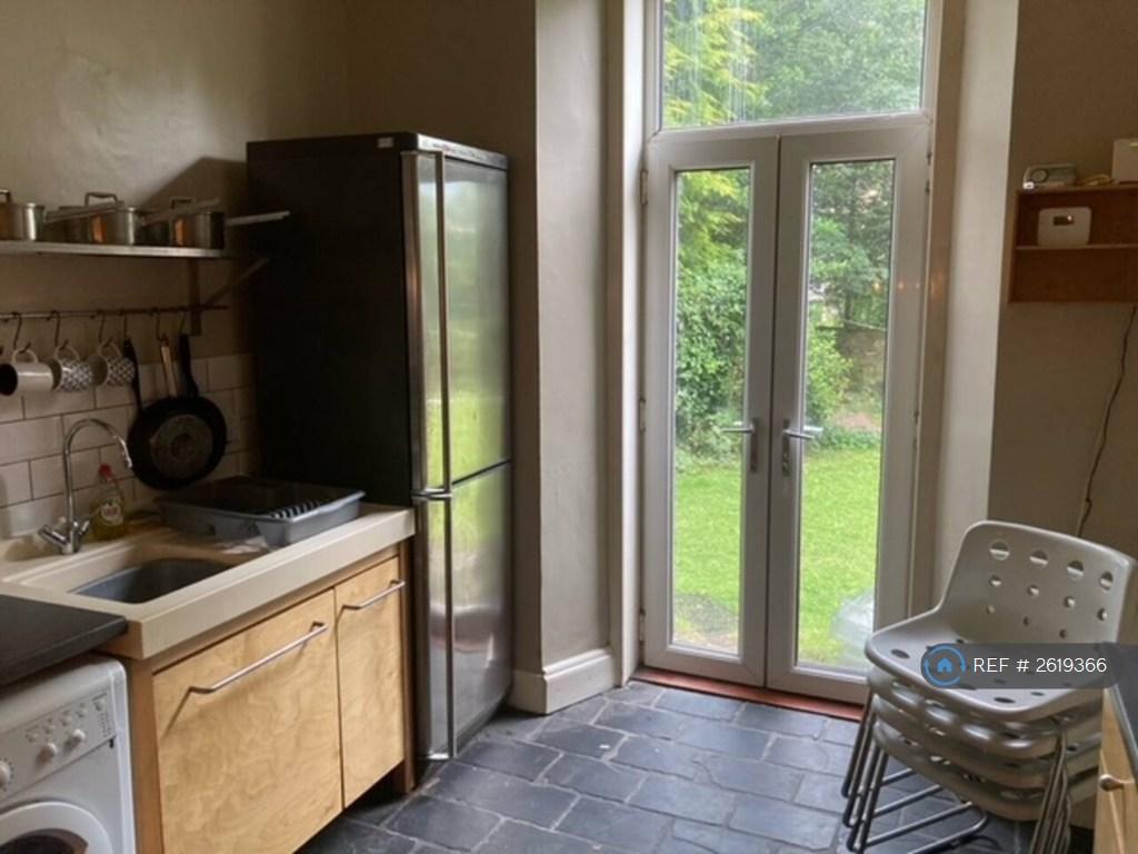 Kitchen With Door Onto Rear Garden