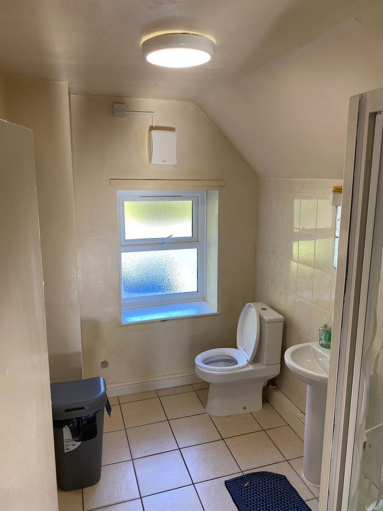 A clean and functional bathroom featuring a WC,...