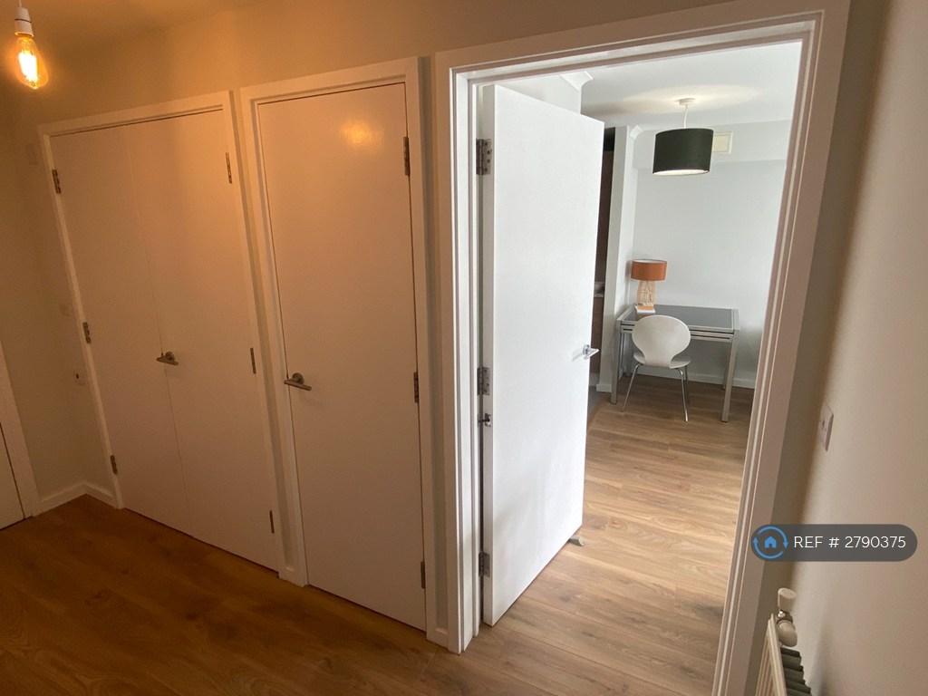 Hallway With Storage Cupboards