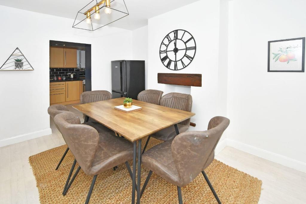 Bright, modern dining area with a sturdy wooden...
