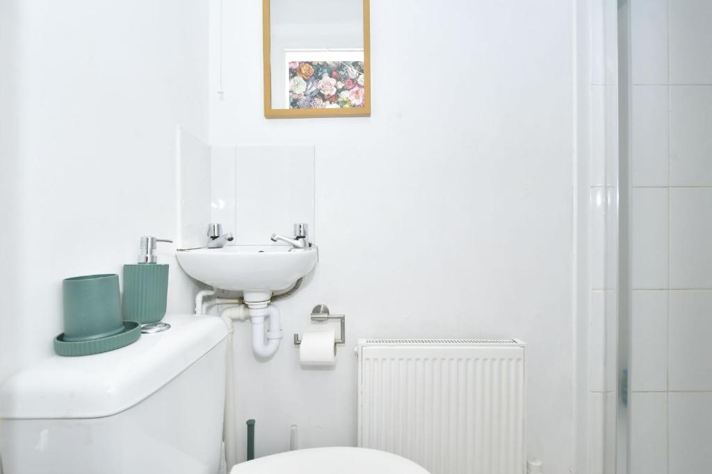 Bright, well-maintained bathroom with a compact...