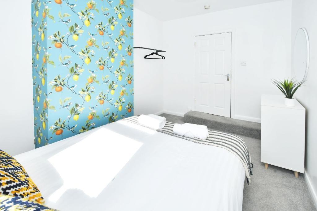 Bright, freshly styled double bedroom with a pa...