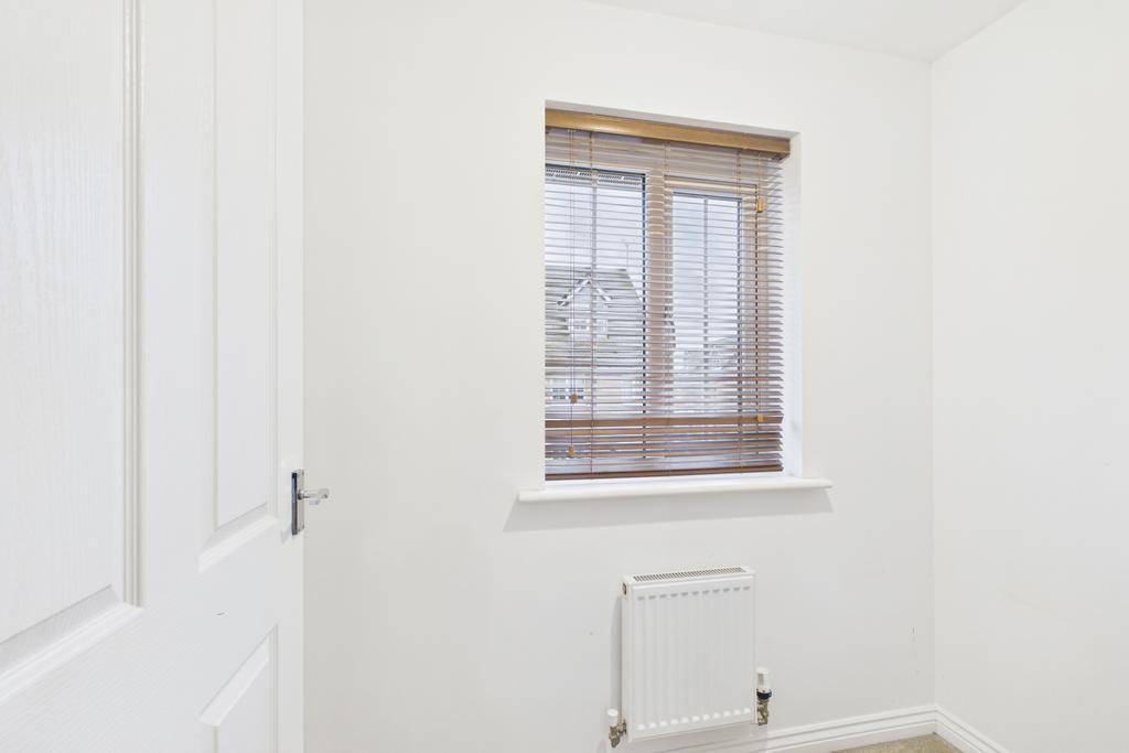 The window on the first floor landing as you turn