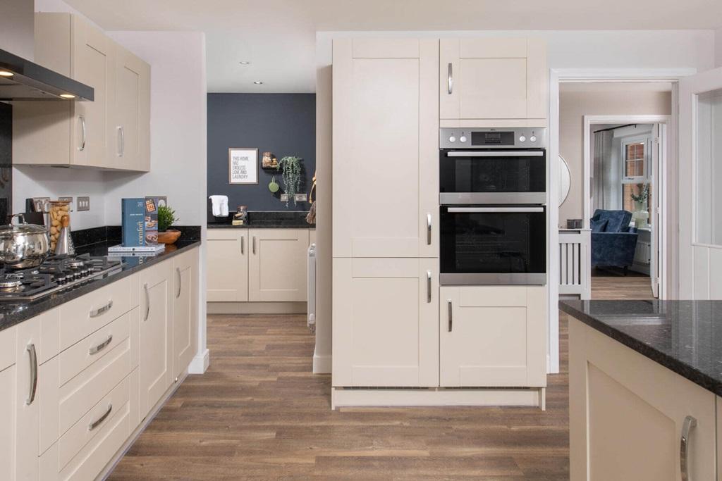 A handy utility area leads from the kitchen,...