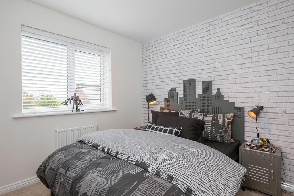A bright, flexible bedroom that's perfect for...