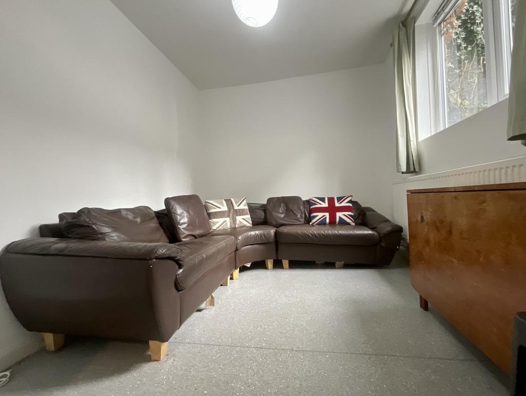 Well-kept lounge with a large corner sofa, neut...