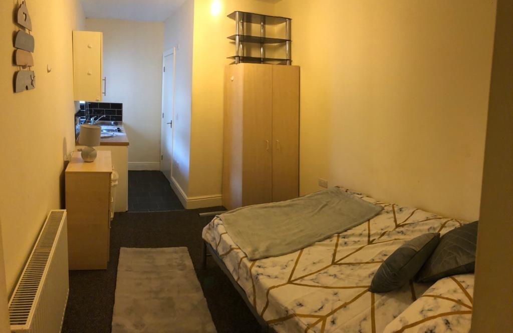 Well-presented furnished bedroom with a cozy do...
