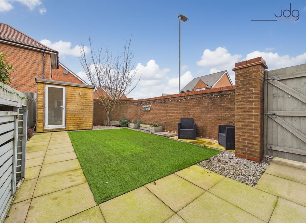 South facing private garden with astro turf and...