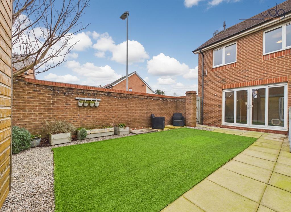 South facing private garden with astro turf and...