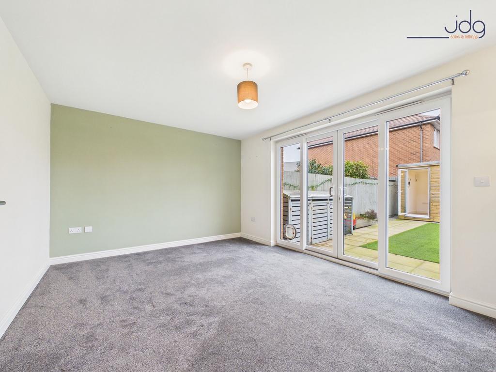 Living Room with sliding doors and media wall...