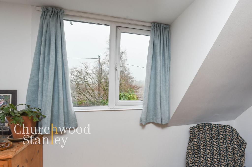 First bedroom outlook (rear)