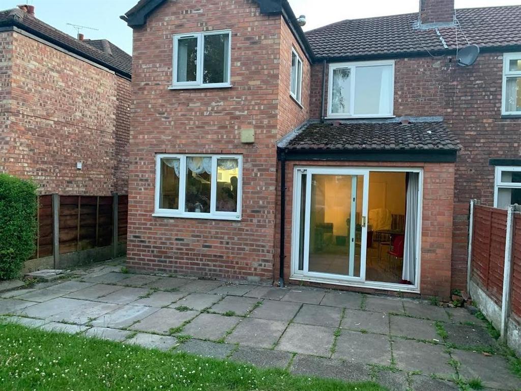 Well-kept brick semi-detached house with a pave...