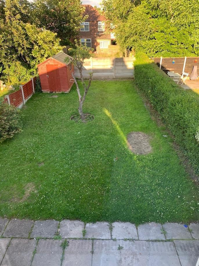 Private rear garden with lawn, mature trees and...