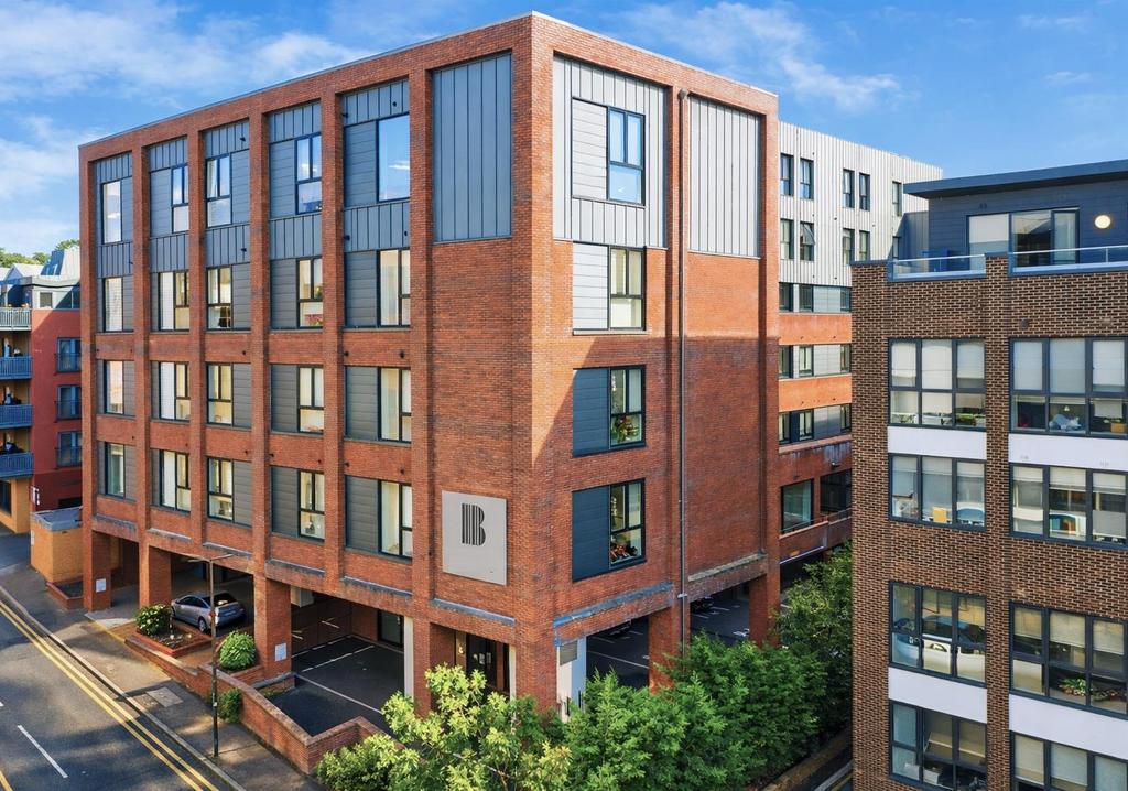 Benedicts Apartments in vibrant city setting.png