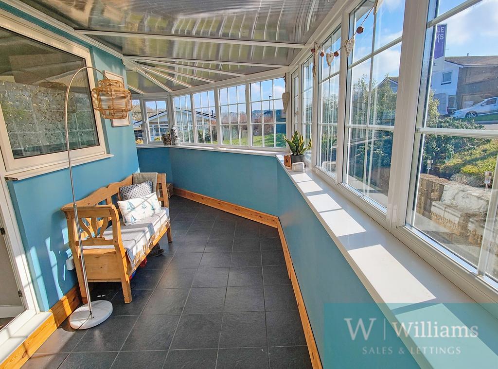 Wrap around conservatory