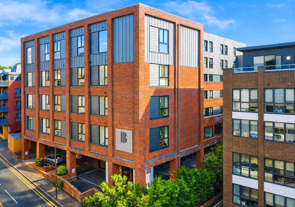 Benedicts Apartments in vibrant city setting.png