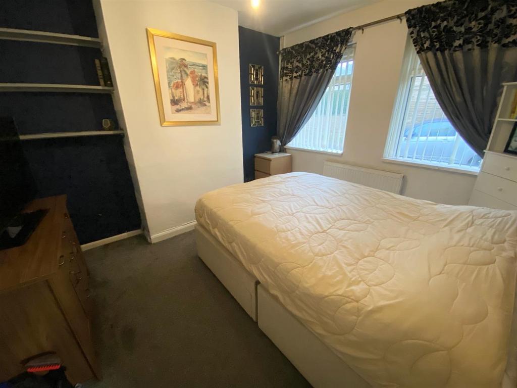Dining room used as bedroom by tenant.jpg