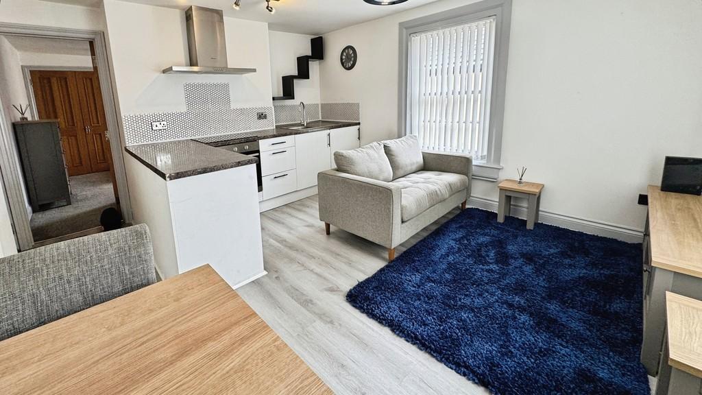 Living room with kitchen