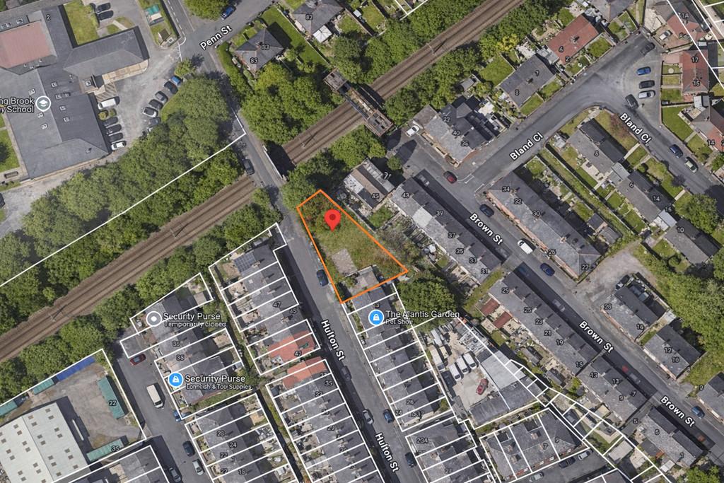 Aerial view of vacant land with pin