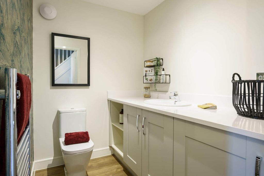 A guest cloakroom completes the ground floor