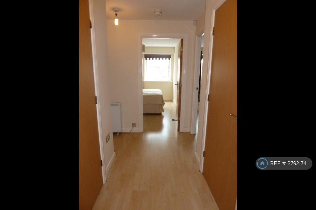 Hallway With Store Room On The Left