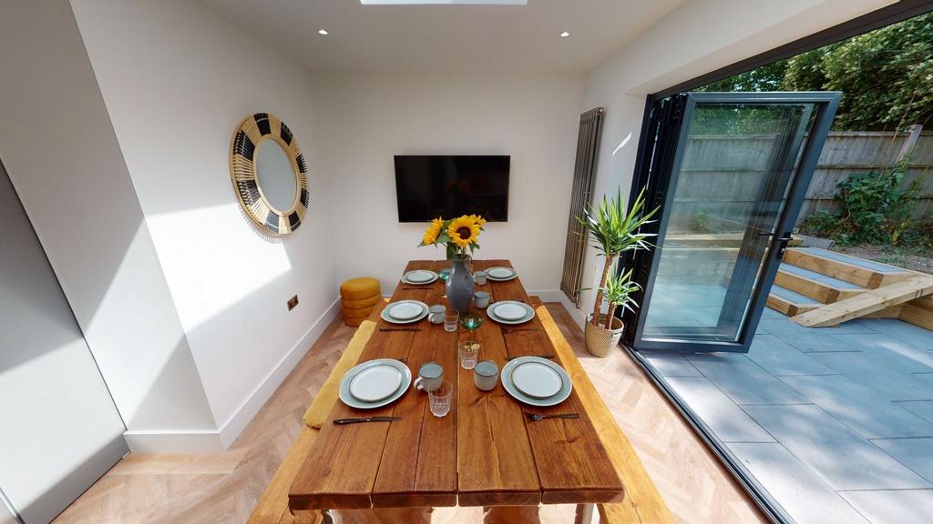Bright and inviting living area featuring a lar...