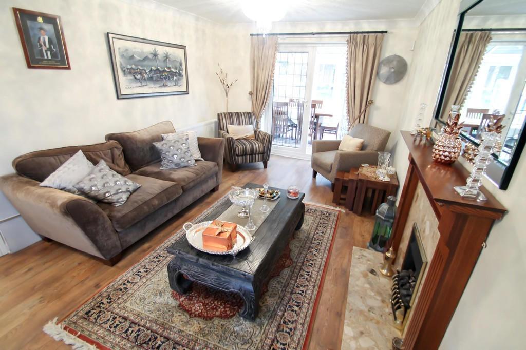 Well-appointed living room with comfy sofas, a ...
