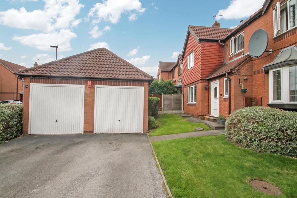 Well-maintained terraced house frontage with a ...