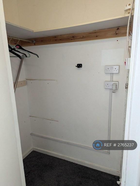 Walk In Cupboard With Hanging Rail