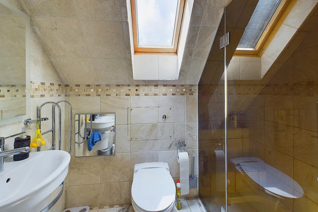En-suite to master bedroom.