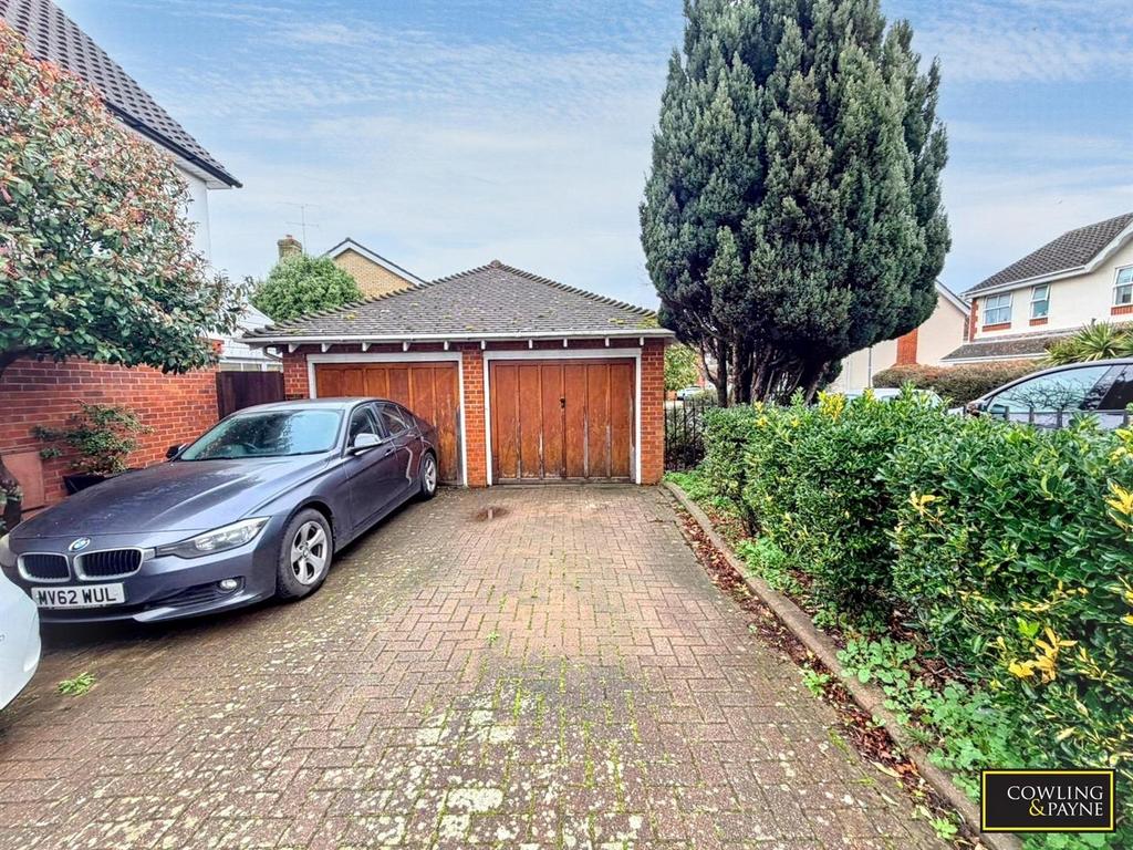 Garage with parking in front