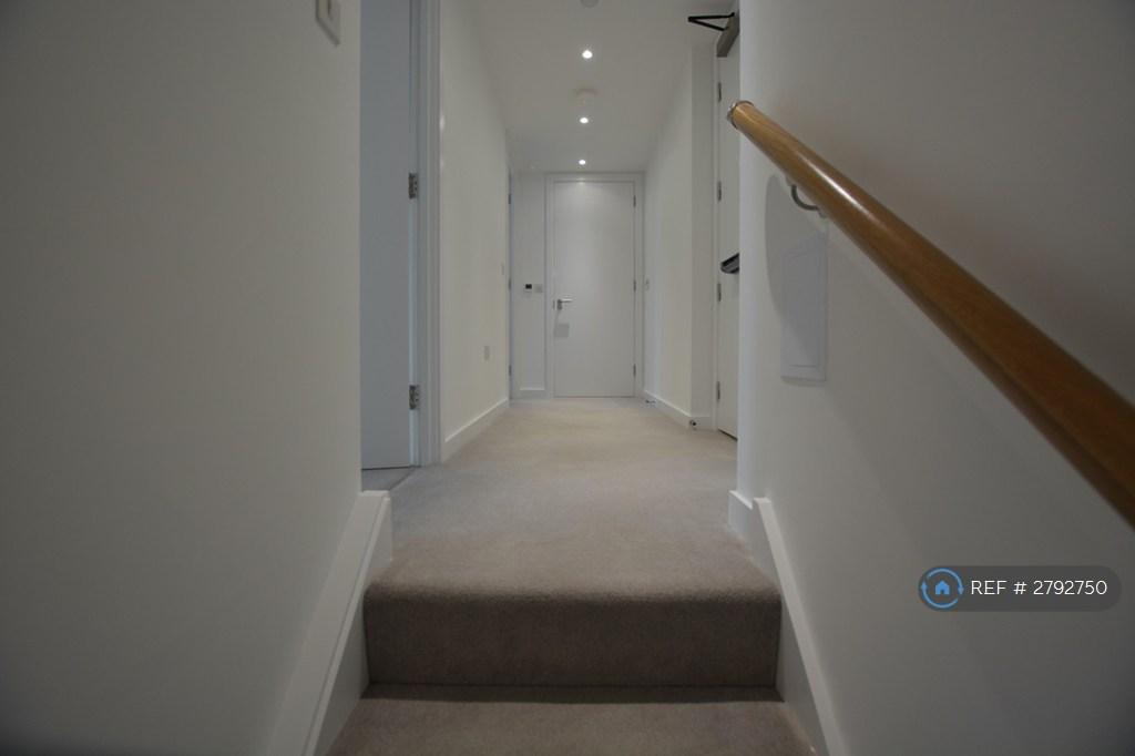 Carpeted Stairs To Second Level