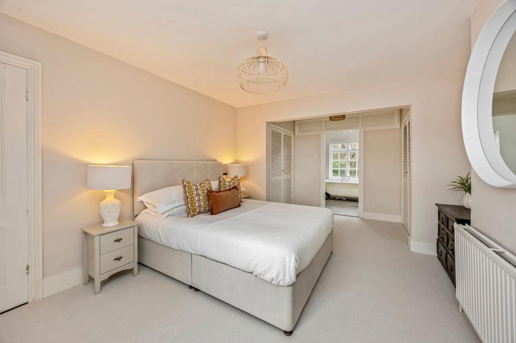 Principle bedroom with extensive wardrobe space