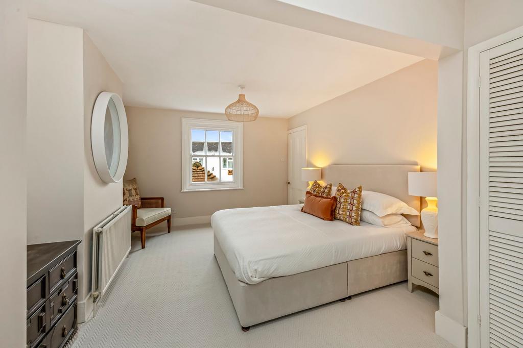 Principle bedroom with extensive wardrobe space