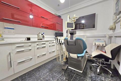 Retail property (high street) for sale, 50-50A Lower Richmond Rd London SW15 1JP
