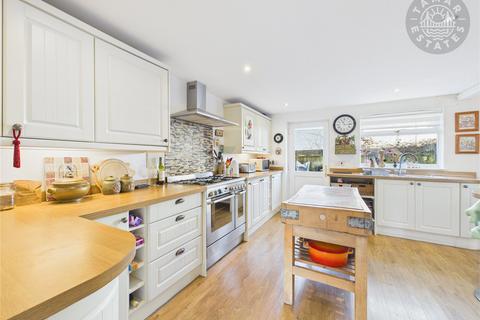 undefined, 'Space, balance and town-centre convenience in one refined detached home'