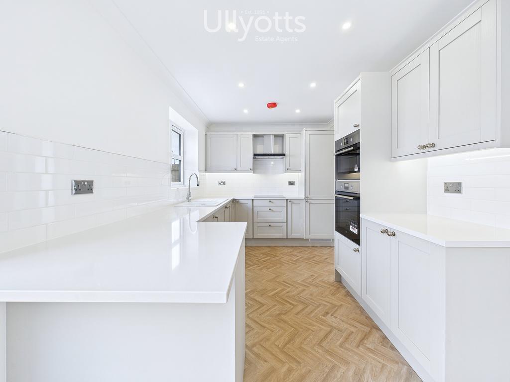 Kitchen with upgraded floor and kitchen layout...