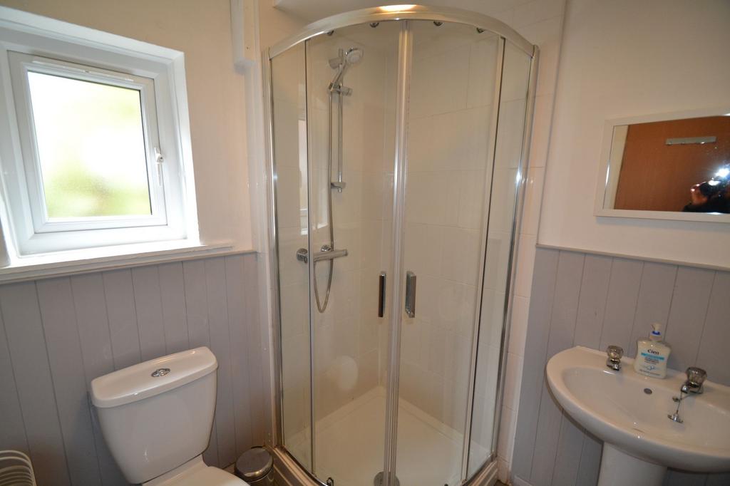 A bright and clean bathroom featuring a spaciou...
