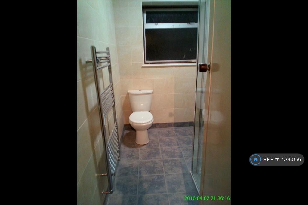 Fully Tiled Modern Bathroom