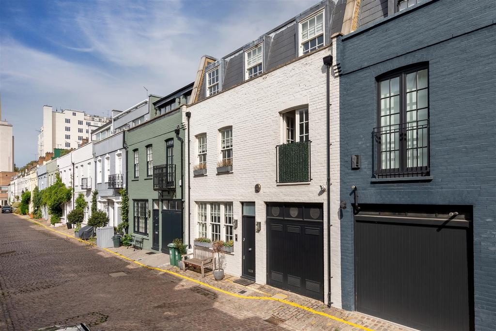 Street scene with property, garage