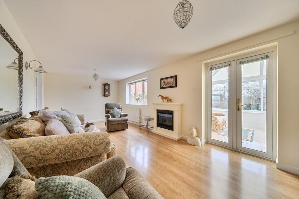 Reception Room with door to Conservatory.jpg