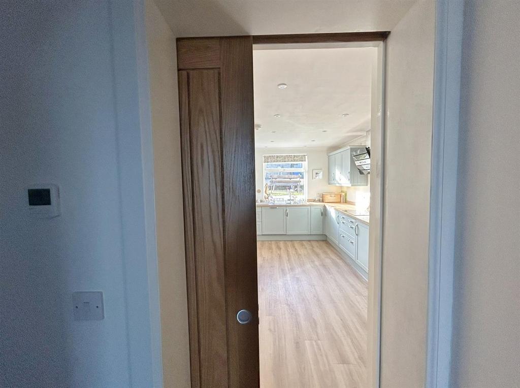 Pocket door into Kitchen / Dining Room
