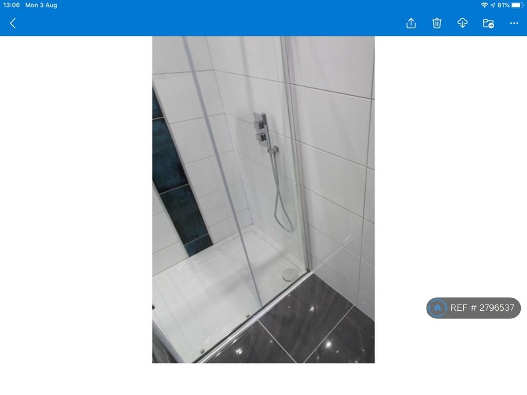 Fully Tiled Shower Room